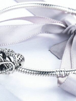 Charm perle en argent coeur et symbole de l'infini liés