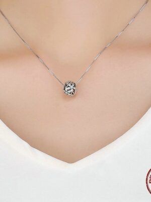 Charm perle en argent ajourée et fleurs aux pistils de zircons blancs